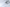 White gaming mouse with geometric design on a light gray background